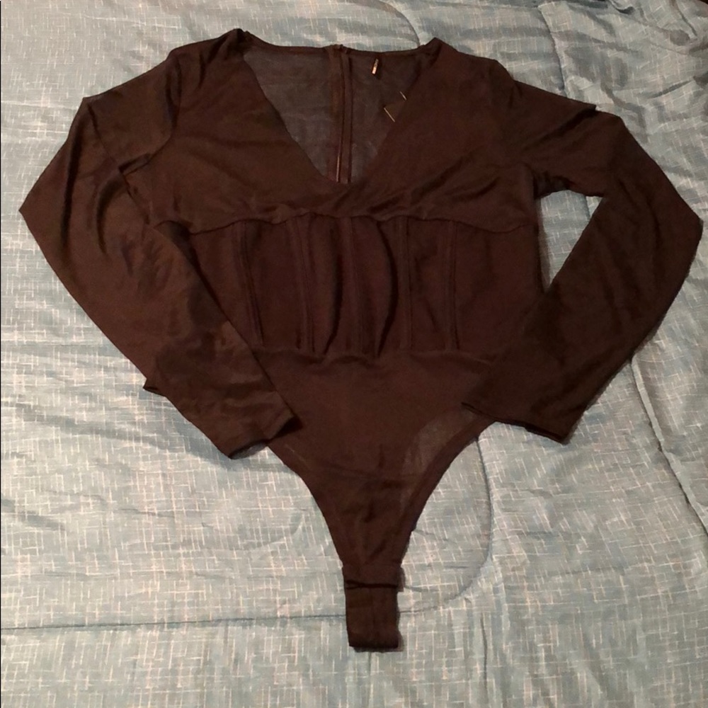 Brand new body suit with built in corset